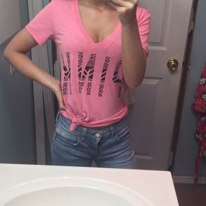 a short sleeve Victoria secret pink shirt